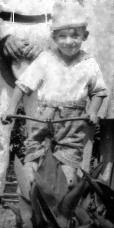 Junior Stancil sits on his bike in 1928.