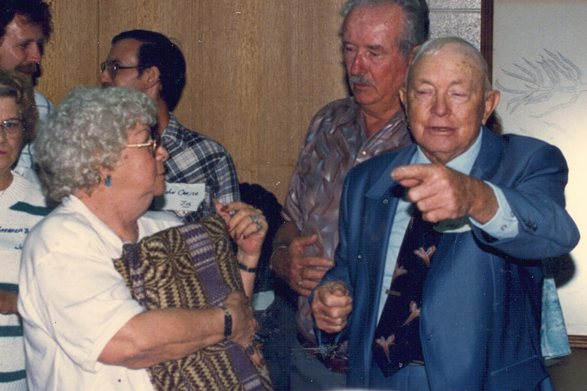 Patricia Stancil Reed holds the Stancil Tapestry made by Delaney Sasser Stancil at the 1989 Stancil Family Reunion in Kenly, North Carolina.