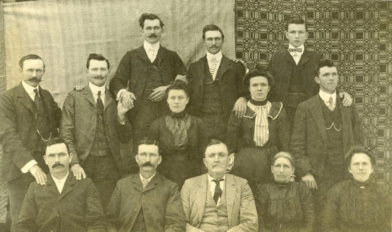 1902 John Thomas Stancil Black and White Family Photo taken in the Glendale Community in Johnston County, North Carolina, shows Samuel Stancil, Henry Stancil, John Thomas Stancil, Delaney Sasser Stancil, Tempy Ann Stancil Hill, Josiah S. Stancil, John Archer Stancil, Catherine Stancil, Arnettie Stancil, George Ira Stancil, Alvin Rosco Stancil, Harvey Arthur Stancil and Thomas Ruffin Stancil.